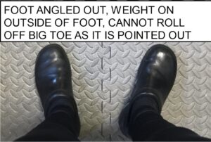 big toes are pointed out and foot is at an angle